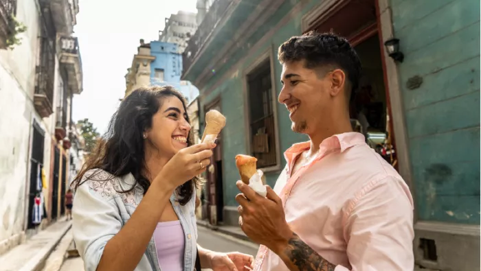 Couple holding ice creams
