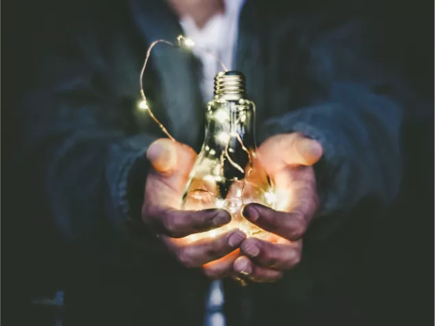 Man holding lightbulb