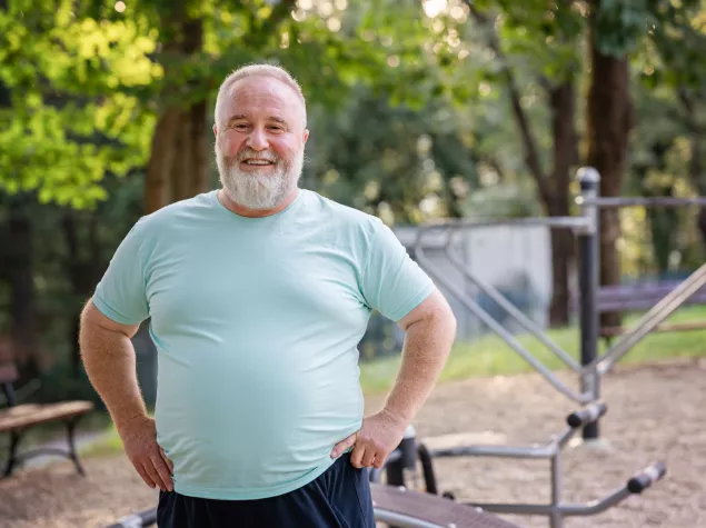 Overweight man exercising