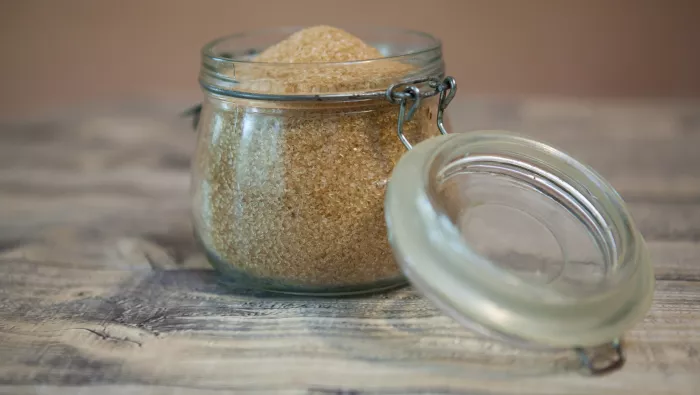 A kilner jar containing brown sugar 