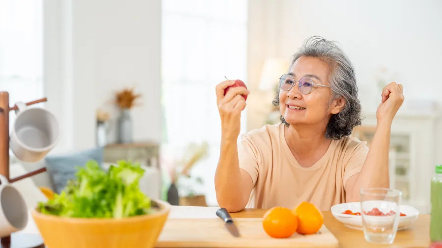 Image of someone eating fruit